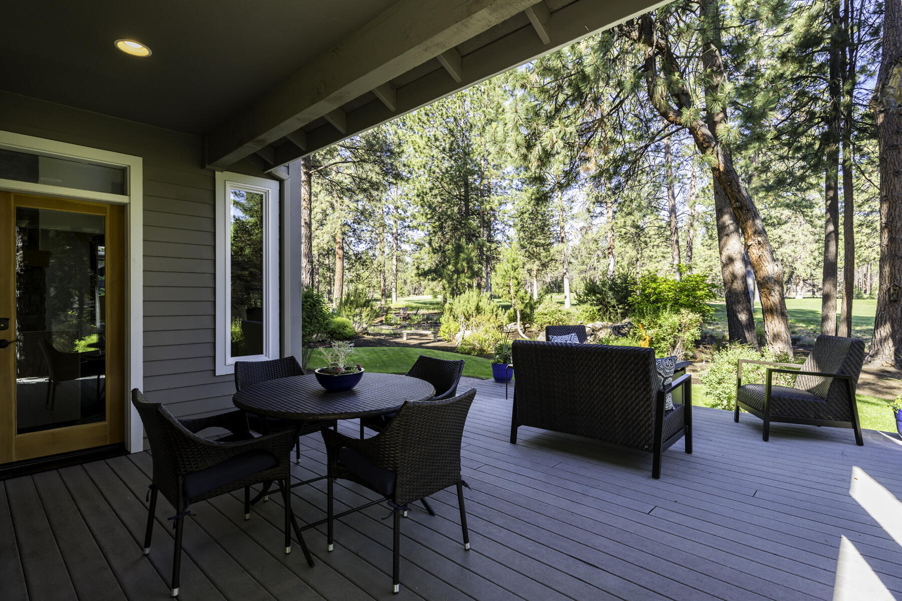 60819 Currant Way Bend, OR 97702 - Photo 37 of 44 Covered back Trex deck is perfect for warm, summer eveinings.