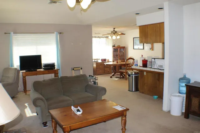 a view of building with car parked