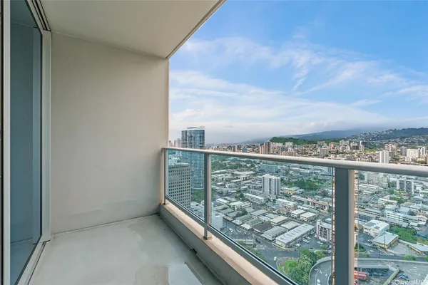 a view of roof with city view
