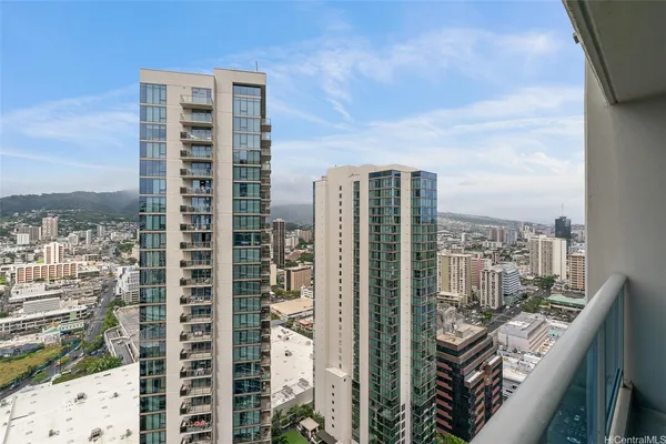 a view of a city with tall buildings