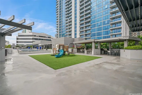 a view of building with yard