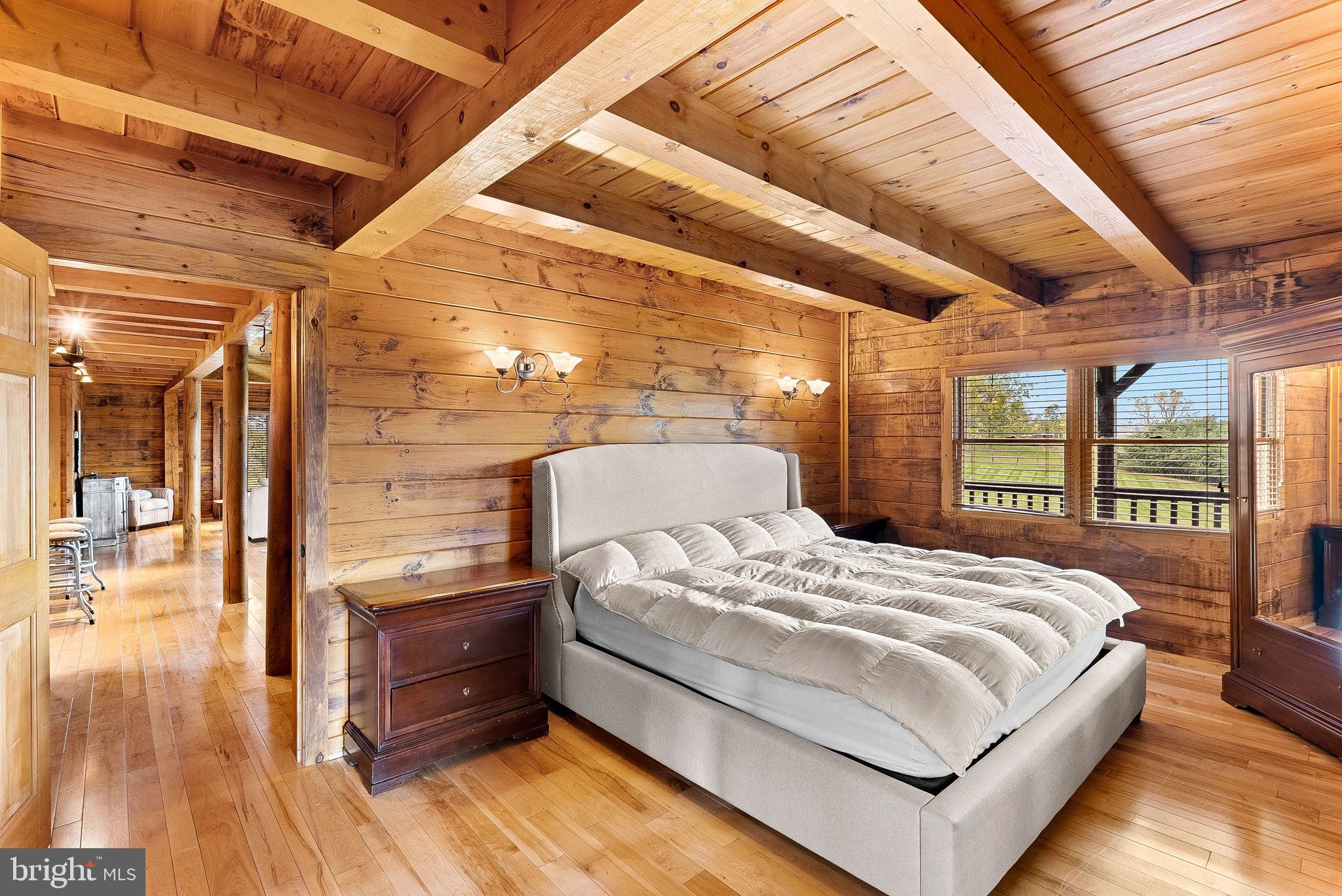18837 Trinity Church Road Purcellville, VA 20132 - Photo 25 of 73 a bedroom with a bed and a large window with the outer view