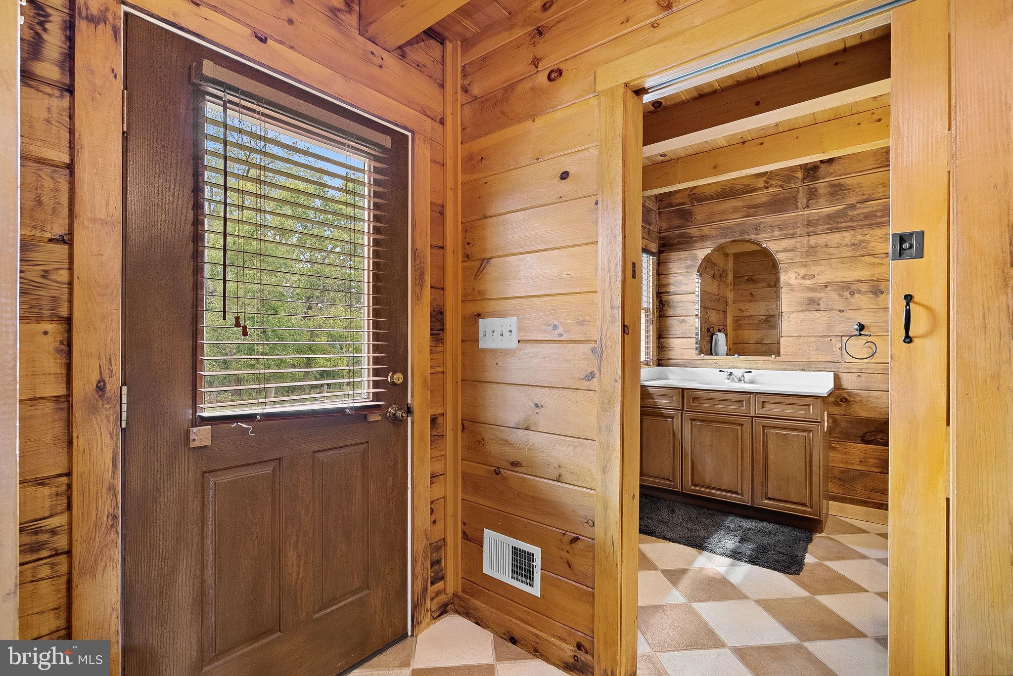 18837 Trinity Church Road Purcellville, VA 20132 - Photo 31 of 73 a bathroom with a granite countertop sink toilet and shower