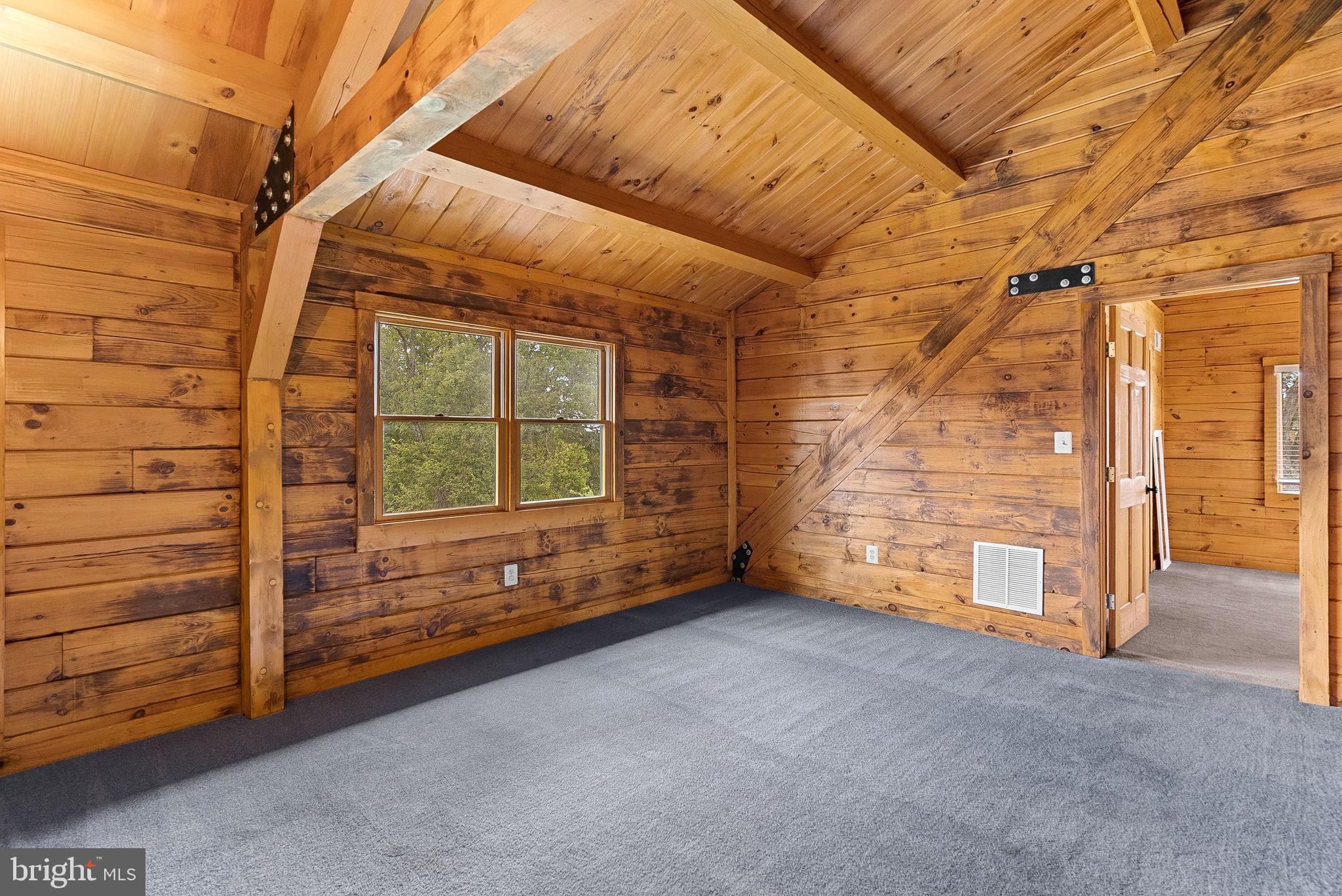 18837 Trinity Church Road Purcellville, VA 20132 - Photo 40 of 73 a view of an empty room with a window