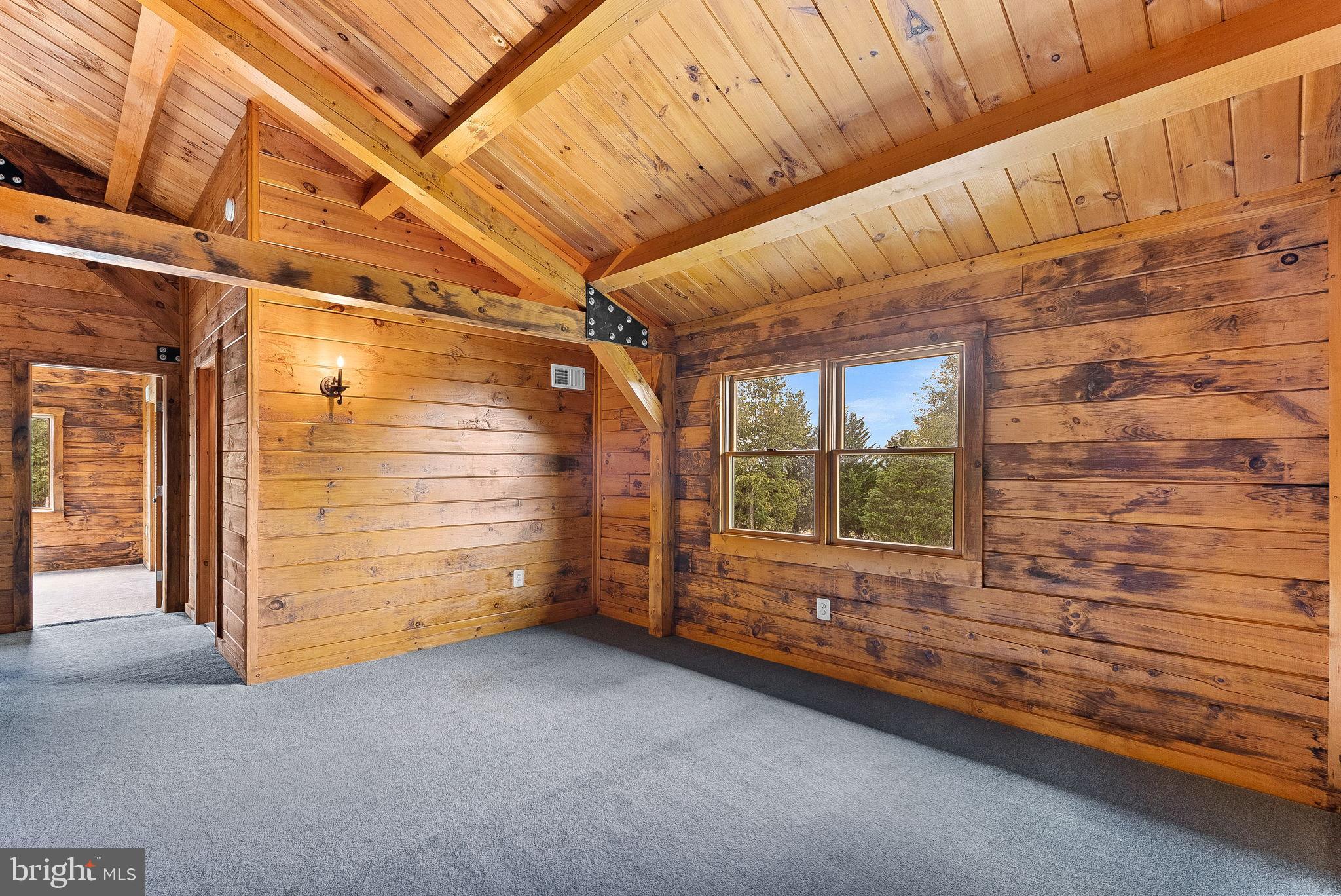 18837 Trinity Church Road Purcellville, VA 20132 - Photo 41 of 73 a view of an empty room with a window