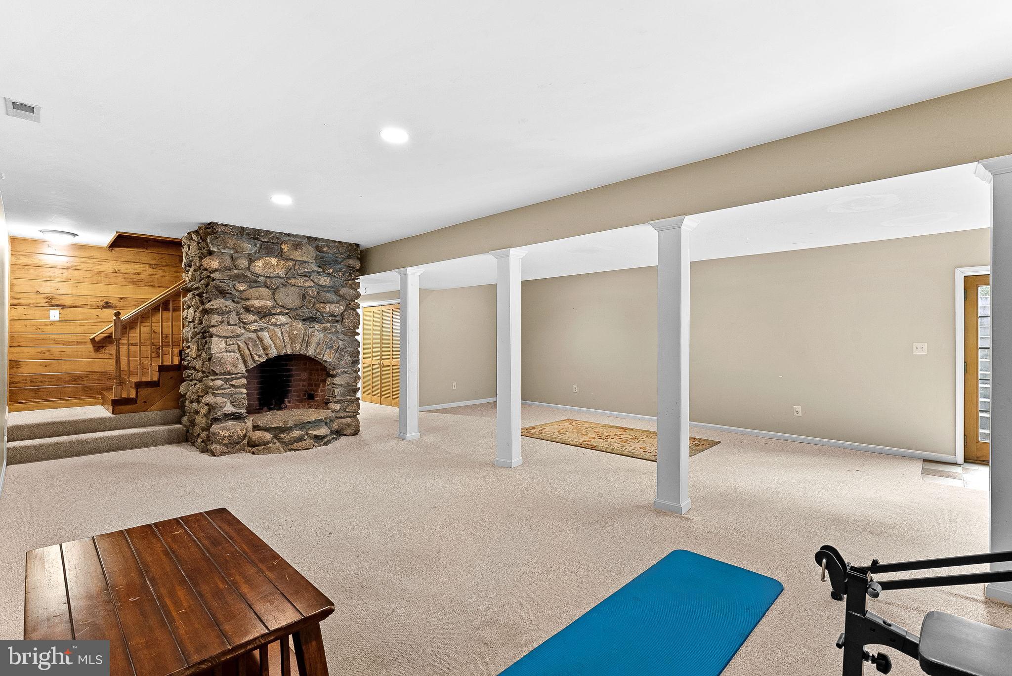 18837 Trinity Church Road Purcellville, VA 20132 - Photo 48 of 73 a view of a livingroom with a fireplace and a couch