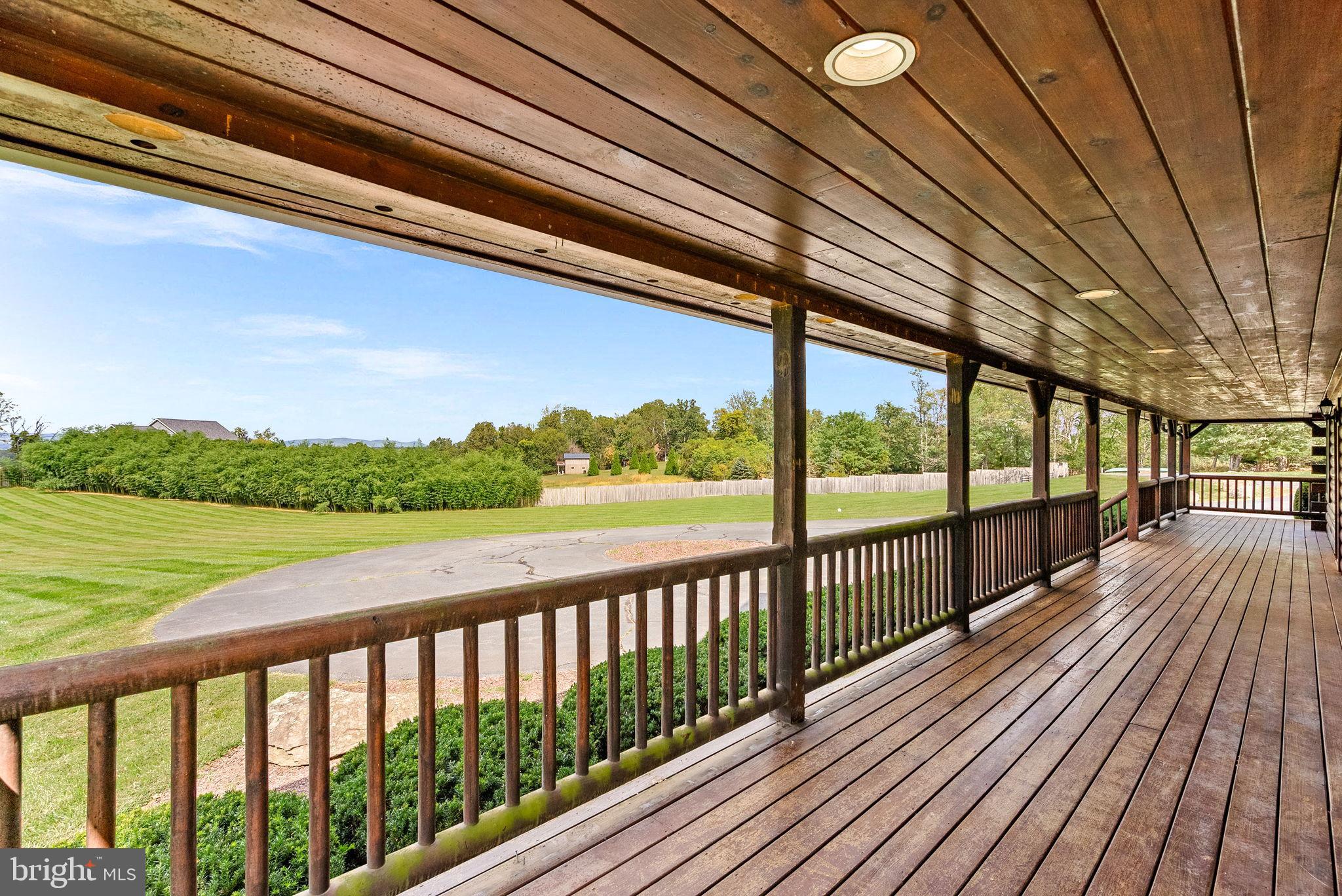18837 Trinity Church Road Purcellville, VA 20132 - Photo 5 of 73 Serene porch with expansive green views.