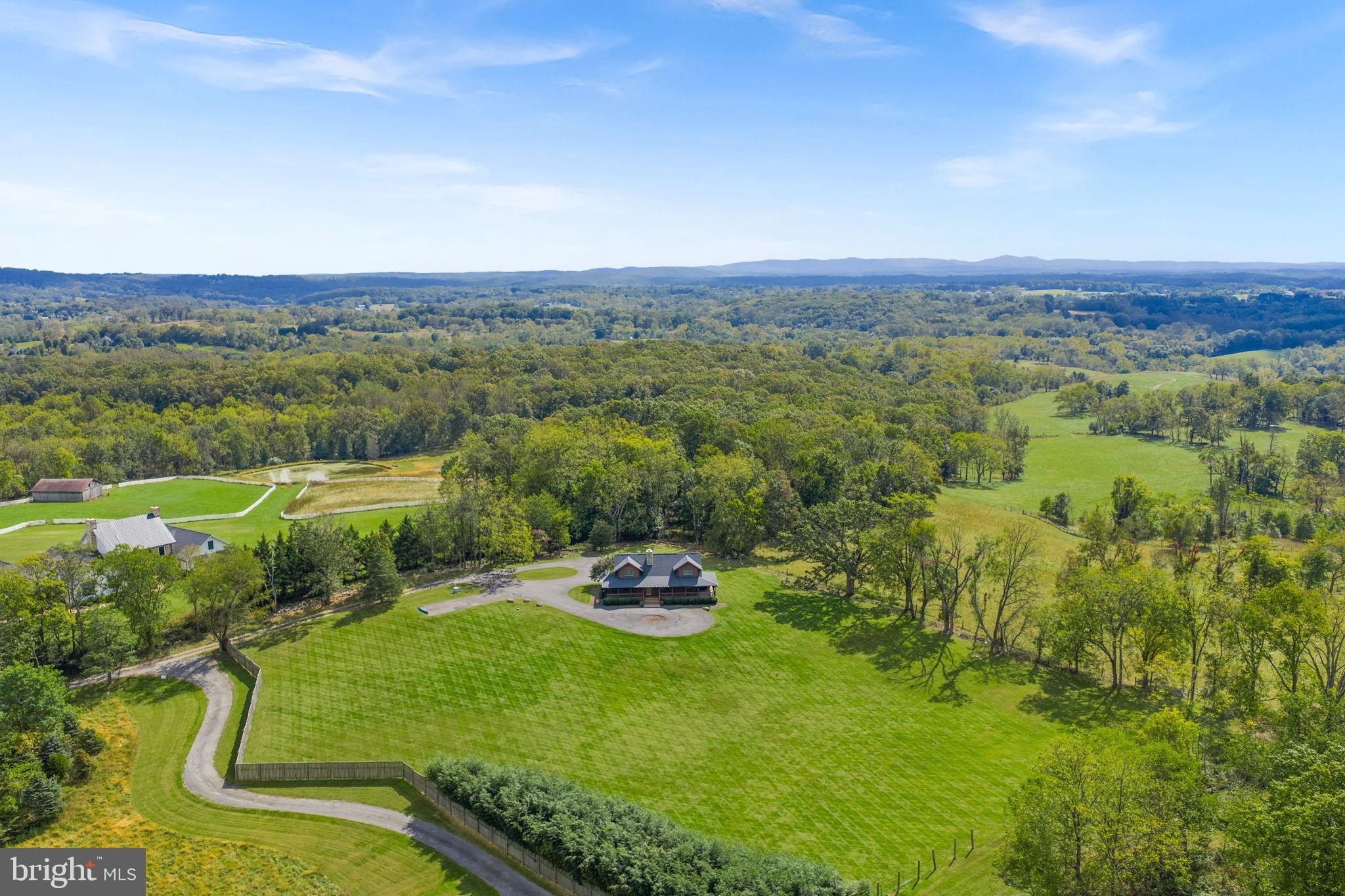 18837 Trinity Church Road Purcellville, VA 20132 - Photo 64 of 73 an aerial view of a golf course with parking space