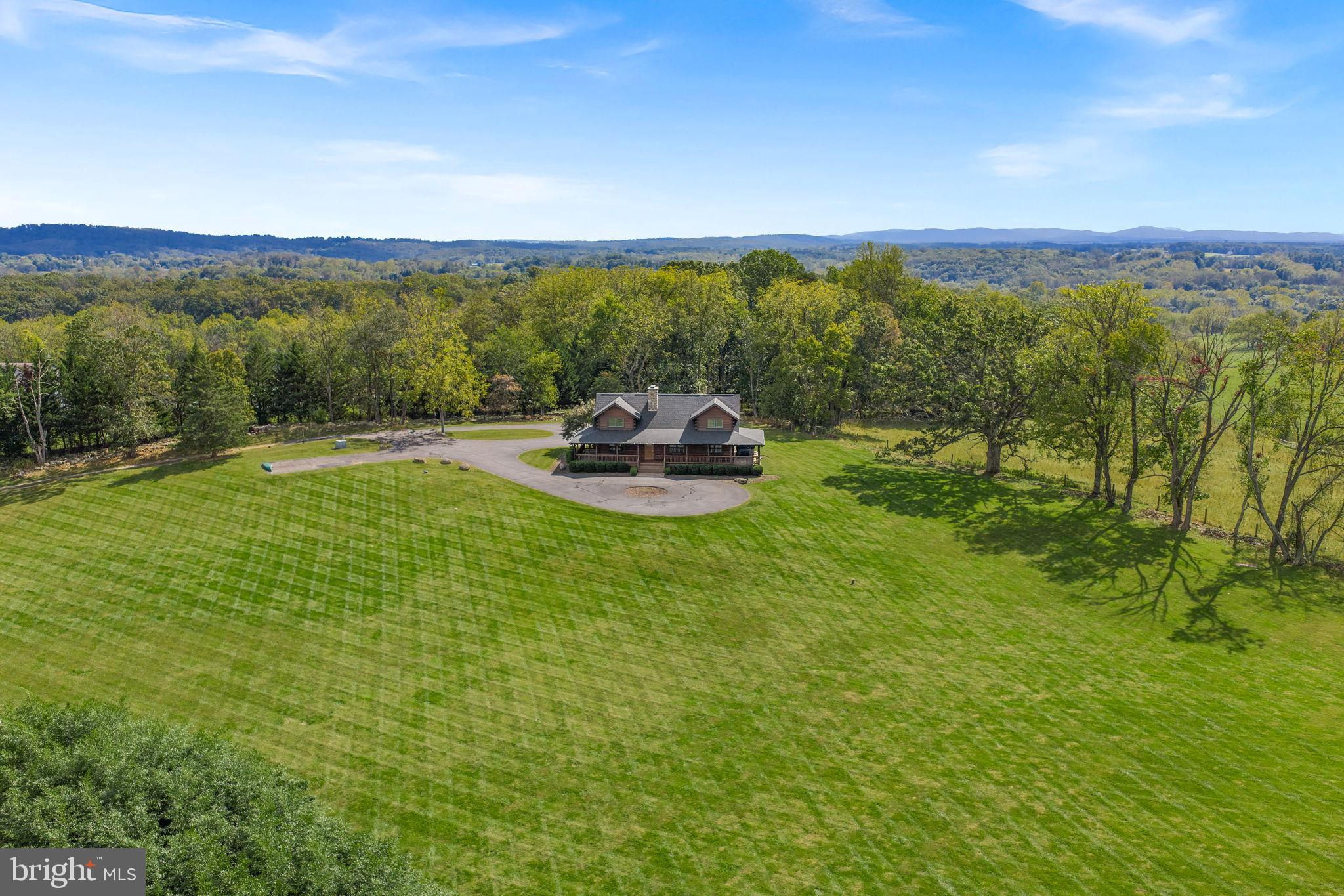 18837 Trinity Church Road Purcellville, VA 20132 - Photo 69 of 73 Serene countryside retreat with lush greenery.