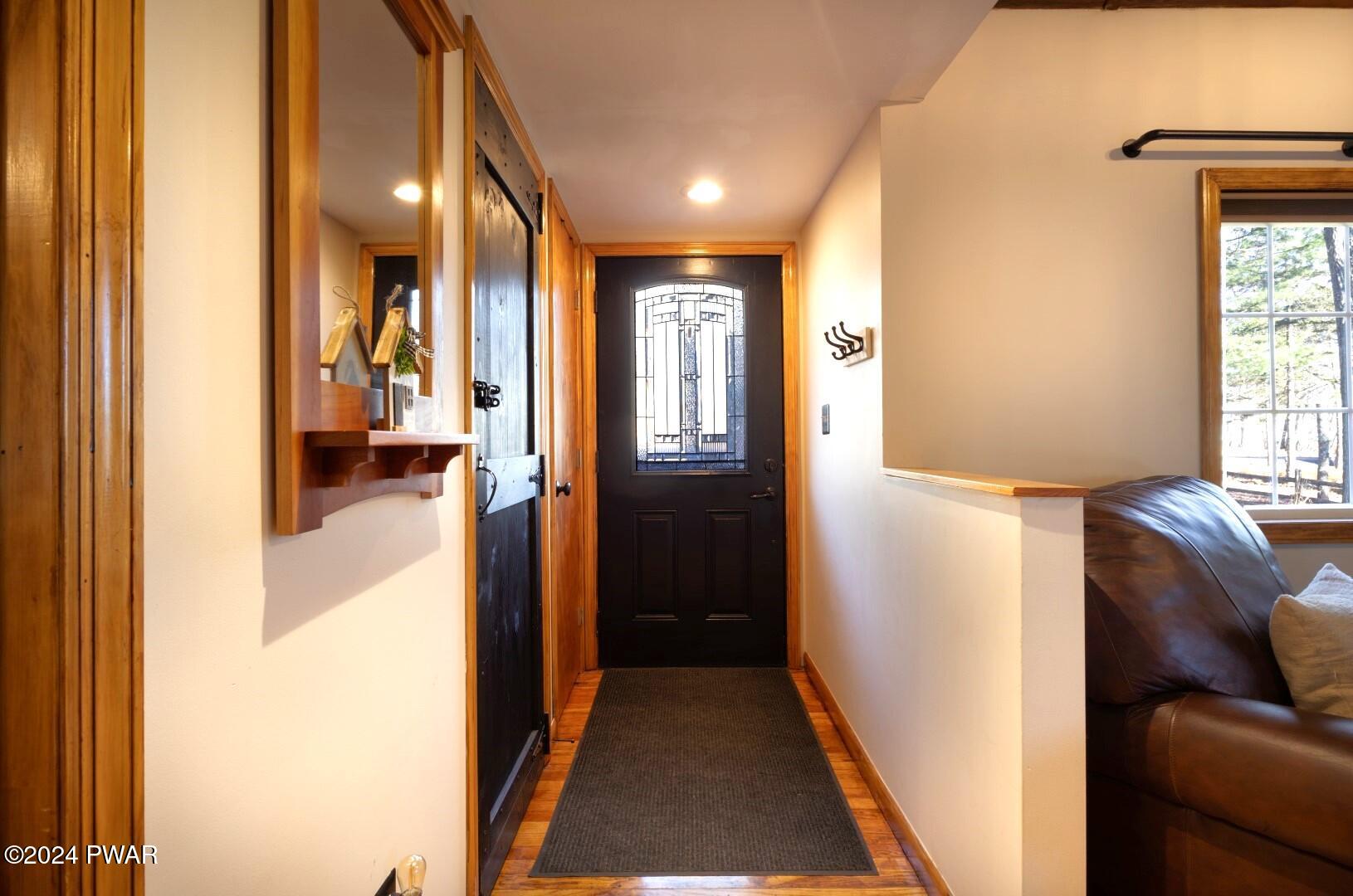 137 Stonehenge Road Milford, PA 18337 - Photo 3 of 30 a view of hallway with furniture and a window