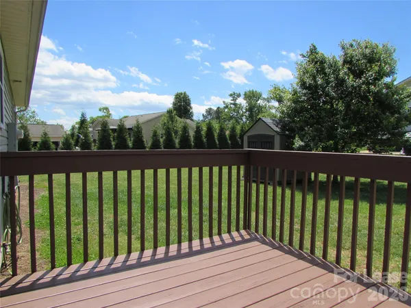 a view of a wooden roof deck