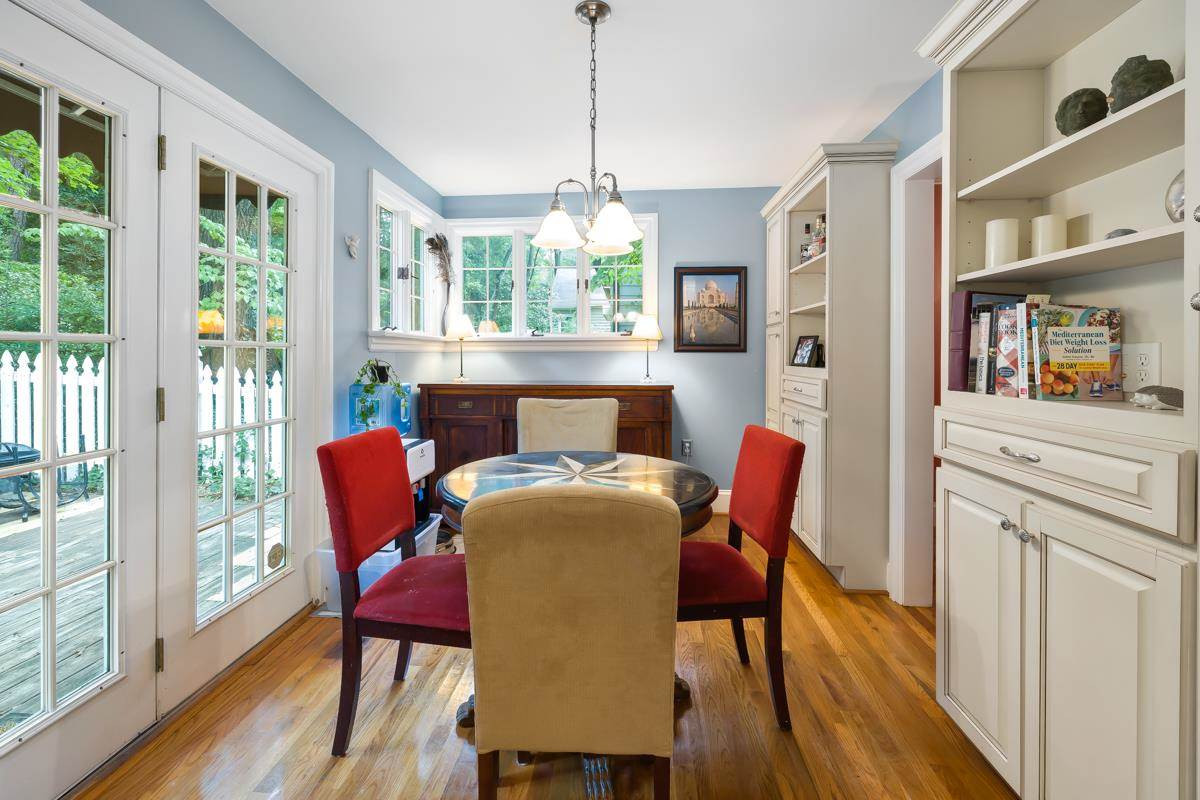 2506 Van Dyke Avenue Raleigh, NC 27607 - Photo 10 of 28 Such a spacious breakfast area that looks out onto the deck and back yard. Breakfast Area
