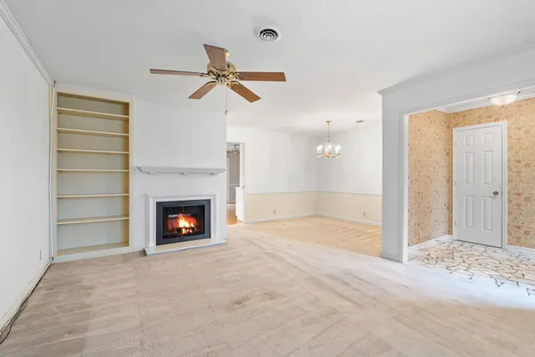 a kitchen with granite countertop a stove and a sink