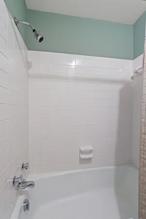 a view of a room with a fan