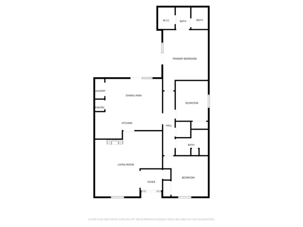 a view of a small space with wooden floor and a bathroom