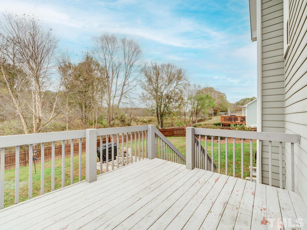 4209 Willow Lake Road Raleigh, NC 27616 - Photo 39 of 54 a view of balcony with wooden floor and fence