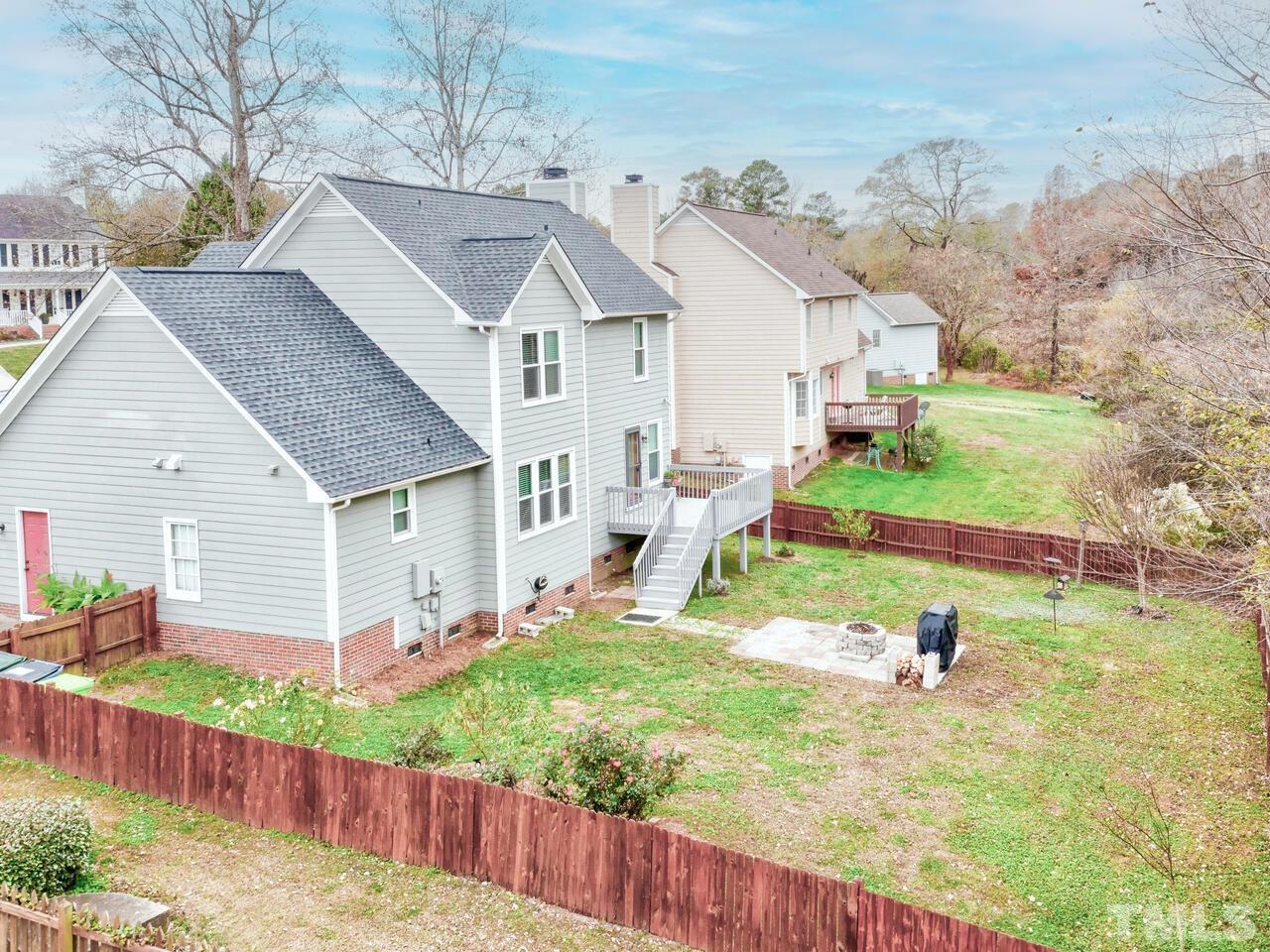 4209 Willow Lake Road Raleigh, NC 27616 - Photo 45 of 54 a view of a house with a yard and fence