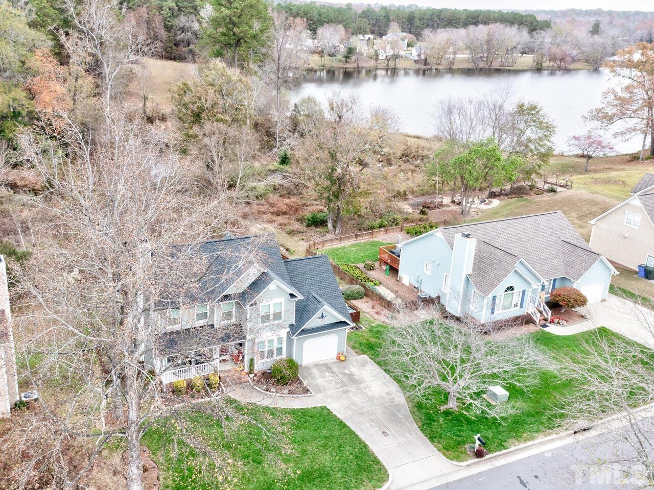 4209 Willow Lake Road Raleigh, NC 27616 - Photo 54 of 54 an aerial view of a house with a lake view
