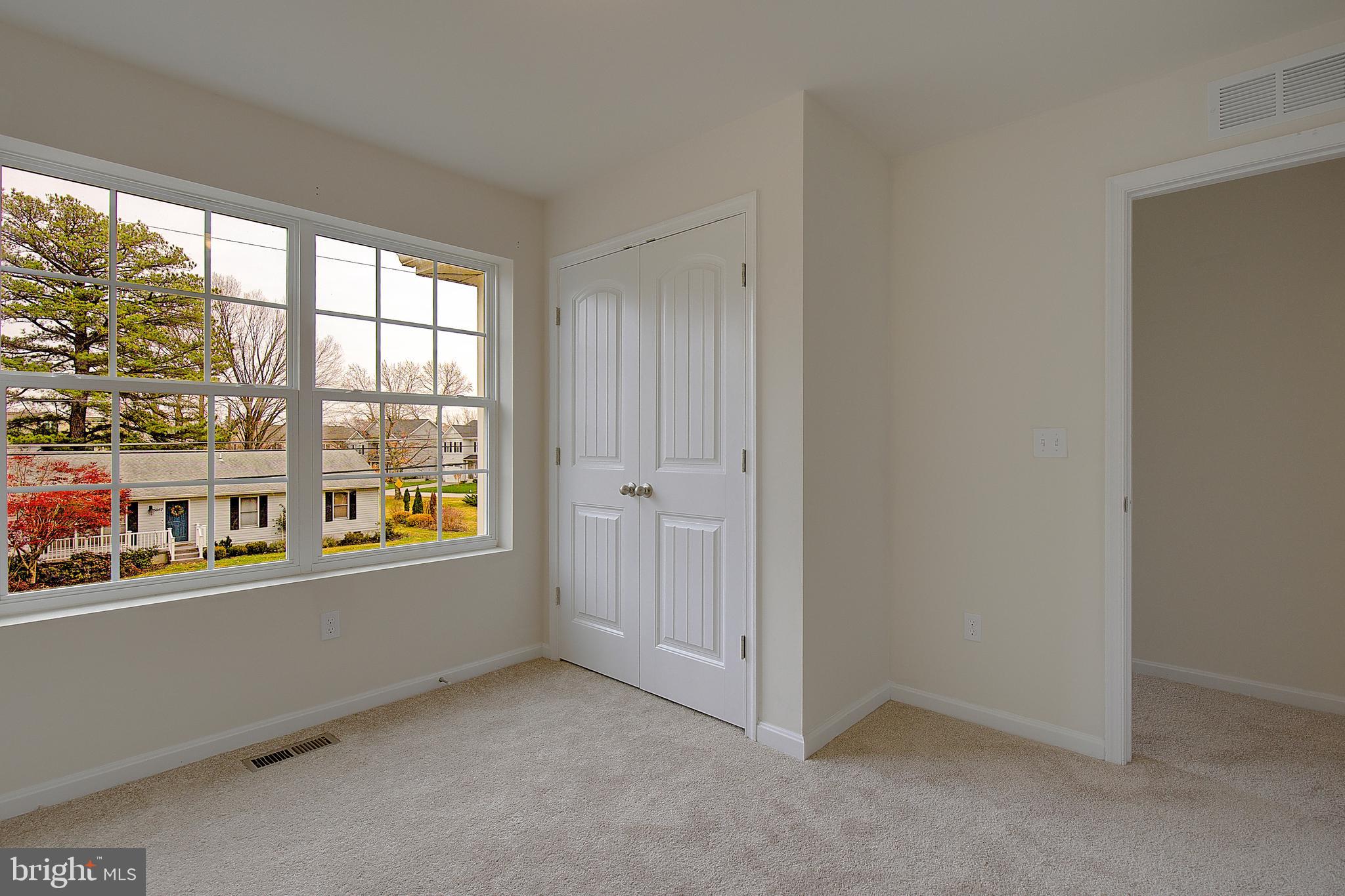 5952 Tyler Road Deale, MD 20751 - Photo 15 of 33 an empty room with windows