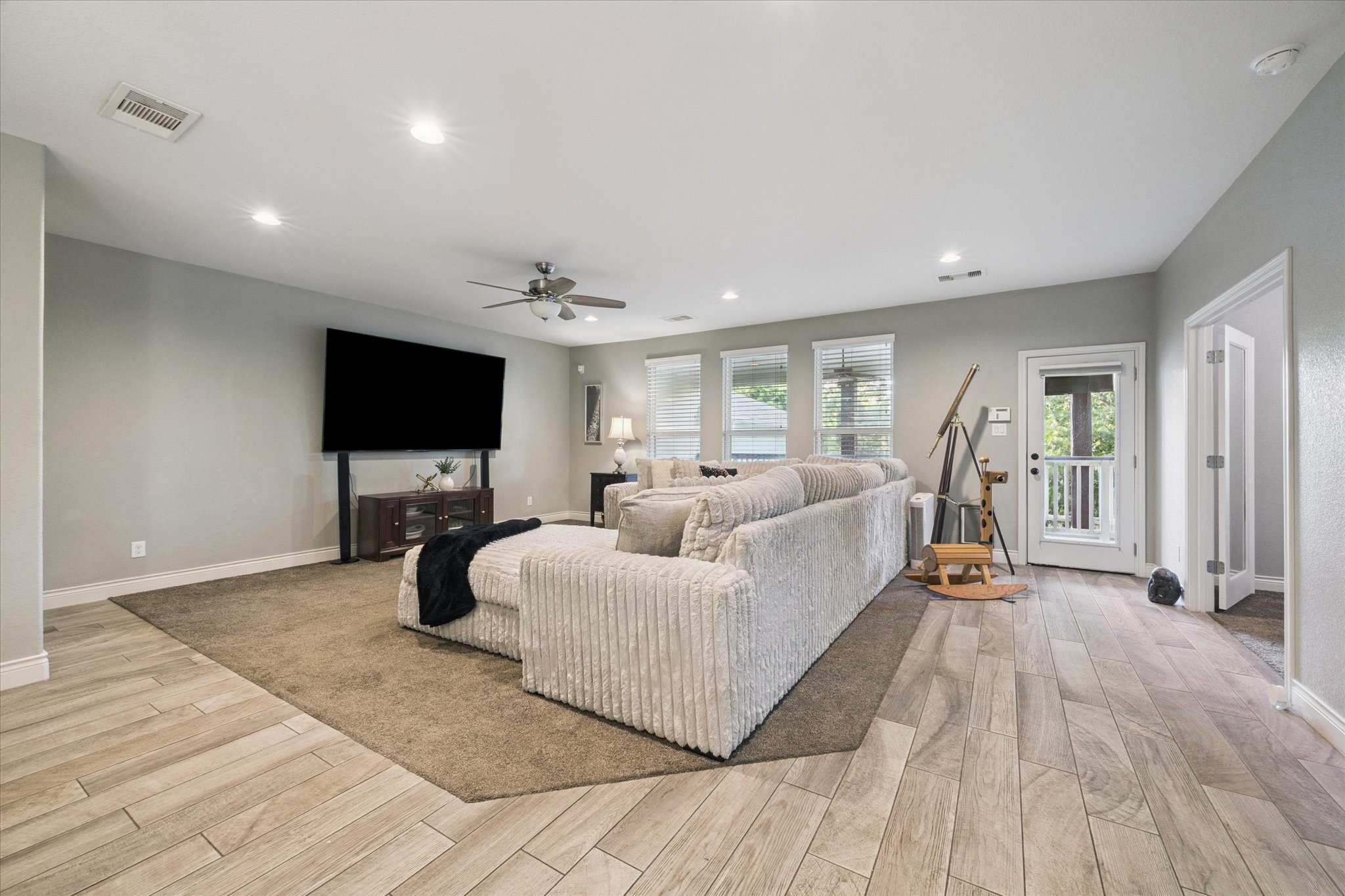207 West 6th Street Kemah, TX 77565 - Photo 11 of 41 a living room with furniture and a flat screen tv