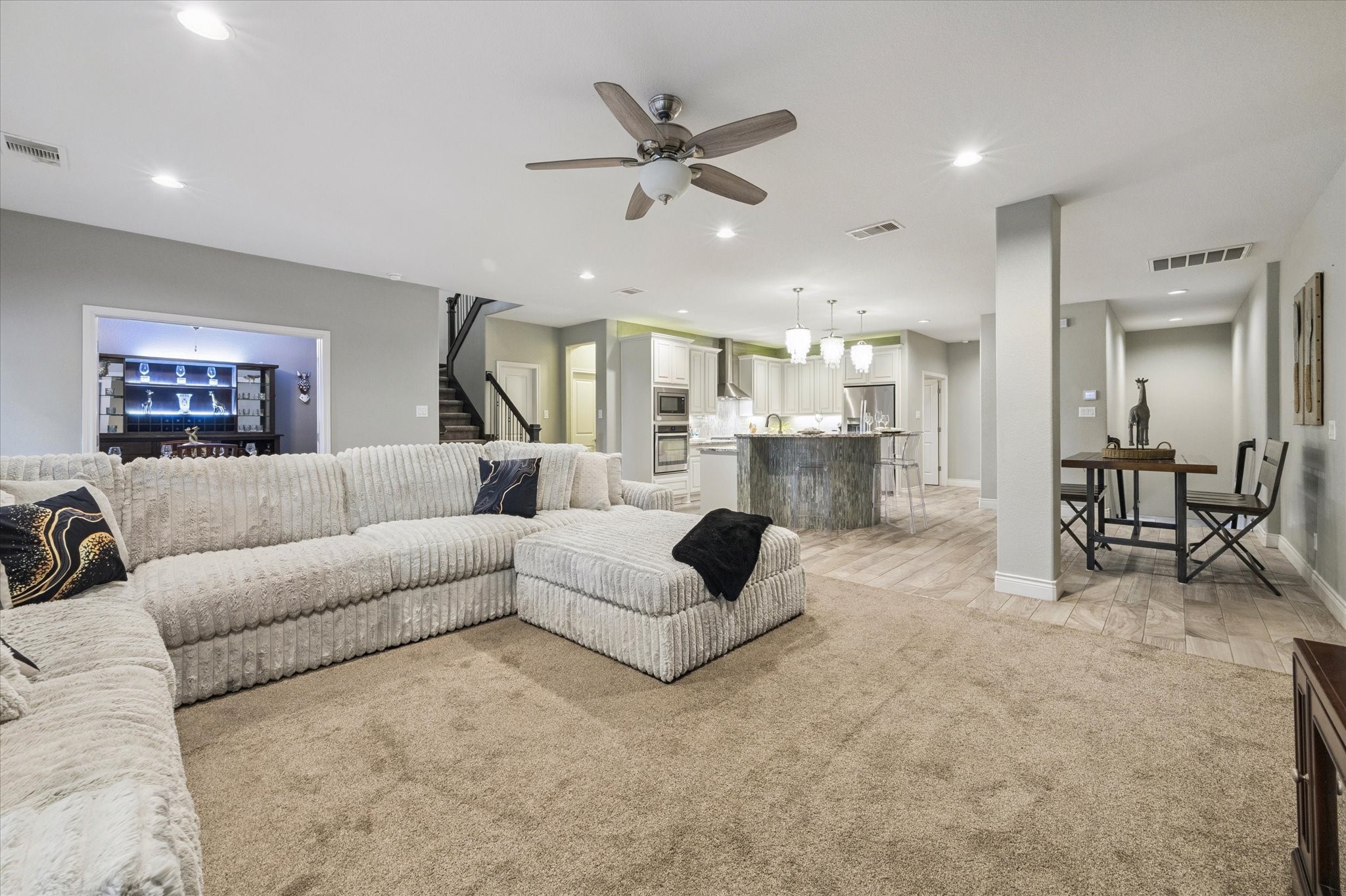 207 West 6th Street Kemah, TX 77565 - Photo 12 of 41 a living room with furniture and a view of kitchen