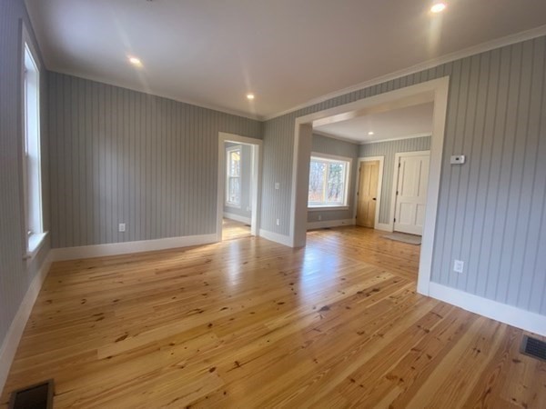 33 Ash Street Spencer, MA 01562 - Photo 16 of 37 a view of a hallway with wooden floor