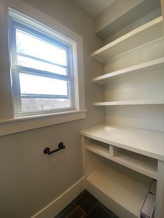 33 Ash Street Spencer, MA 01562 - Photo 23 of 37 a view of a room with rack on the wall