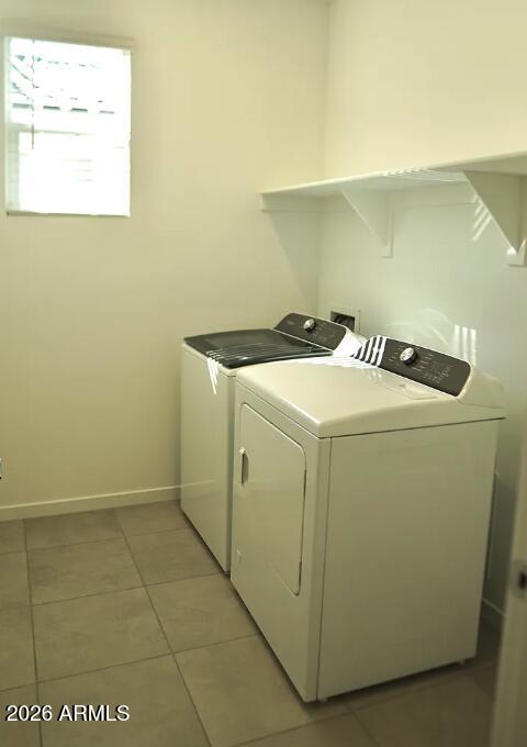 2426 Grenache Road San Tan Valley, AZ 85143 - Photo 11 of 29 a utility room with dryer and washer