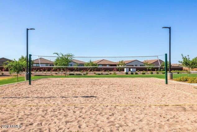 2426 Grenache Road San Tan Valley, AZ 85143 - Photo 17 of 29 a view of a road with a yard
