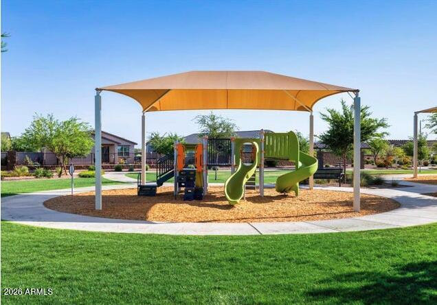 2426 Grenache Road San Tan Valley, AZ 85143 - Photo 24 of 29 a view of backyard with swimming pool and seating space