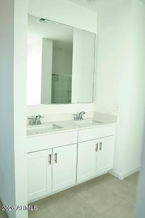 2426 Grenache Road San Tan Valley, AZ 85143 - Photo 8 of 29 a bathroom with a sink and a mirror