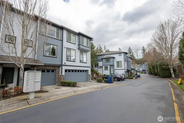 a view of a street with a building in the background