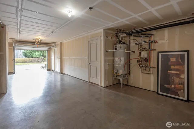 a view of empty room with wooden walls