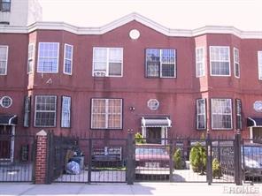 a front view of a building with glass windows
