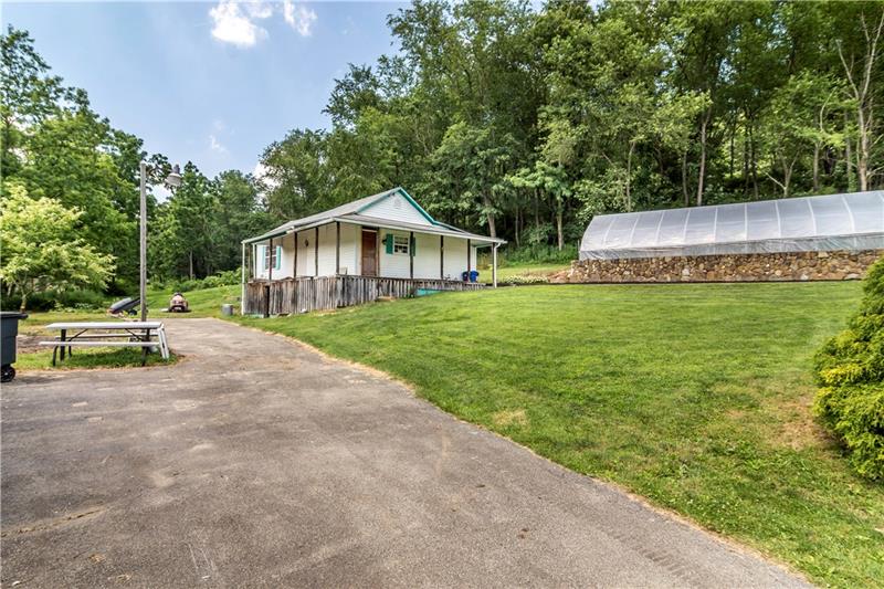 581 Arden Road Washington, PA 15301 - Photo 23 of 25 A shot of the guest quarters, long drive, and the green house!