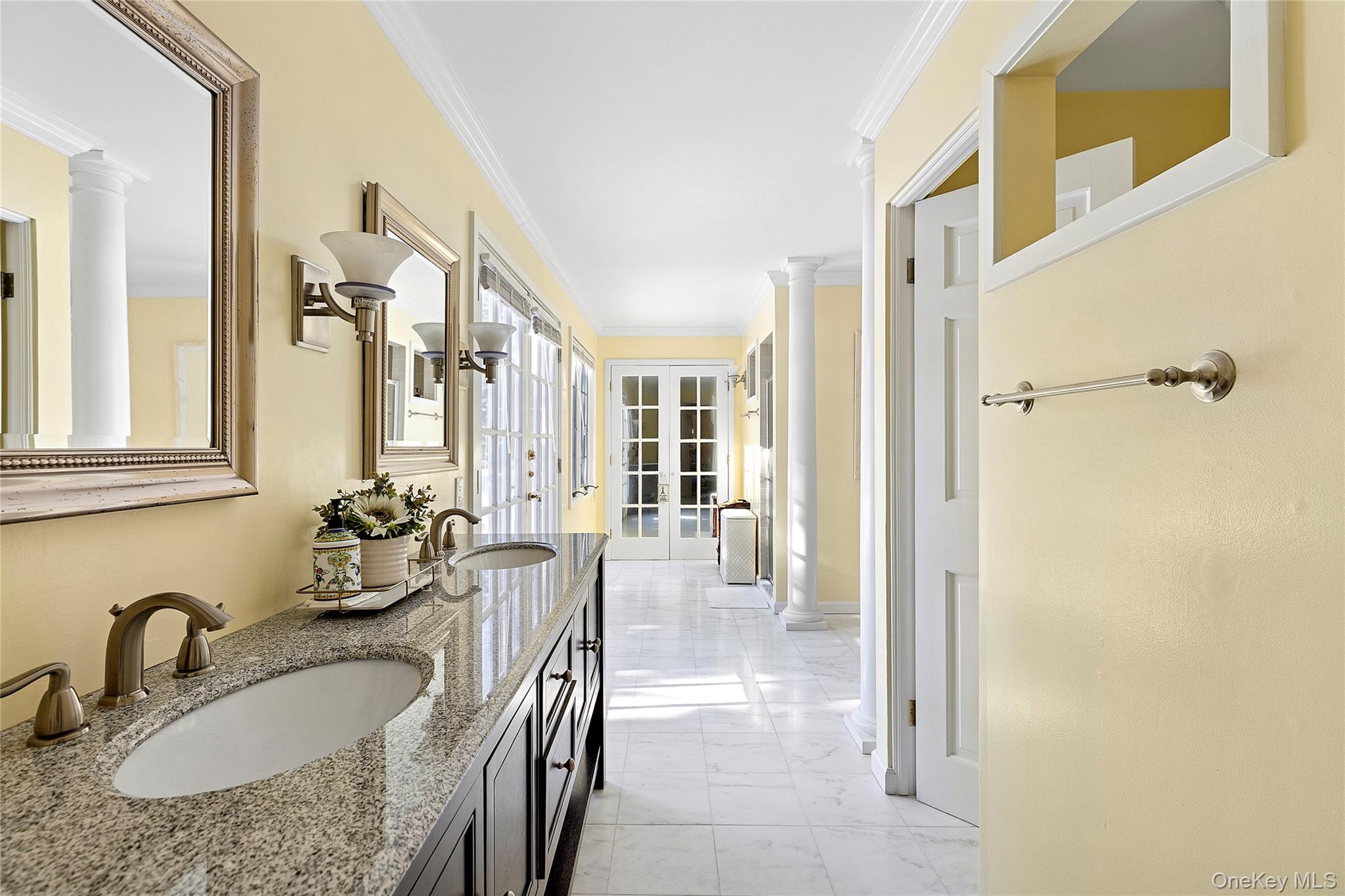 33 Bridgefield Road, Unit 2446 MAIN STREET Bridgehampton, NY 11932 - Photo 13 of 28 a bathroom with sinks granite countertop tub sink and mirror