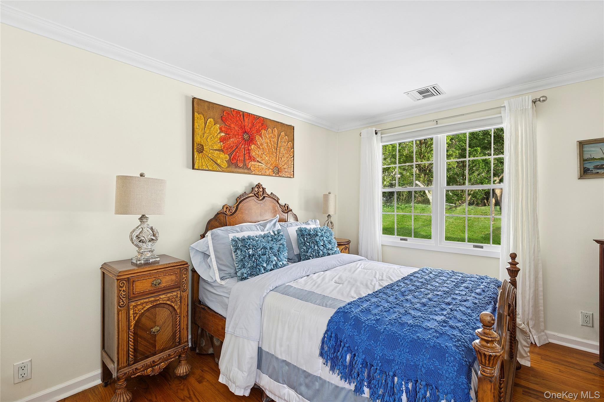 33 Bridgefield Road, Unit 2446 MAIN STREET Bridgehampton, NY 11932 - Photo 16 of 28 a bedroom with bed and a window
