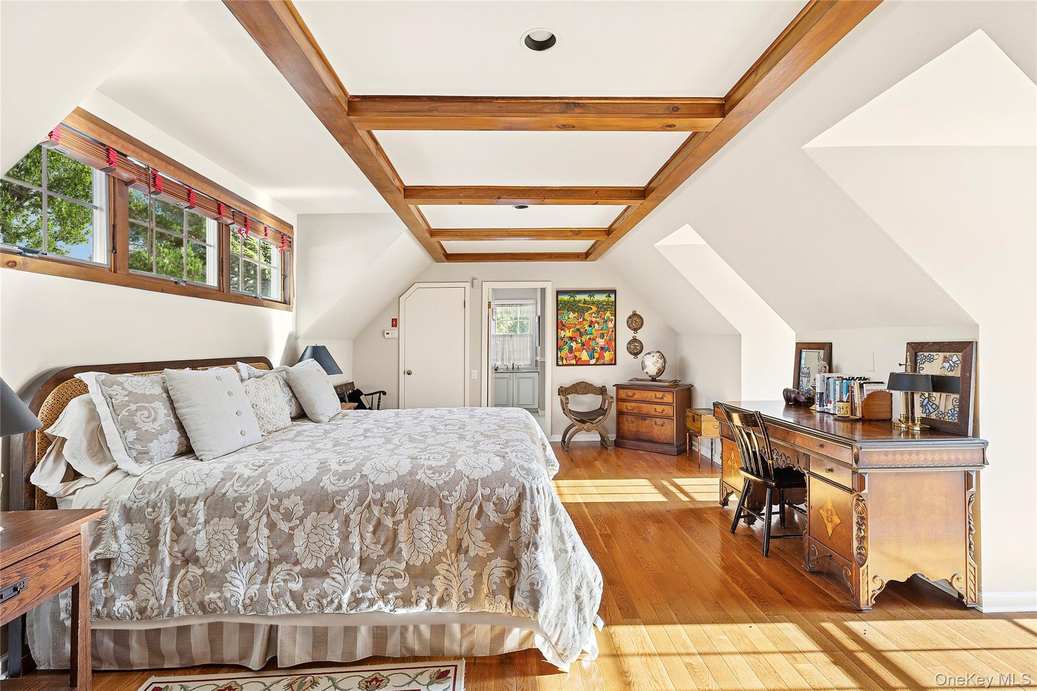 33 Bridgefield Road, Unit 2446 MAIN STREET Bridgehampton, NY 11932 - Photo 21 of 28 a bed room with a bed and a large window