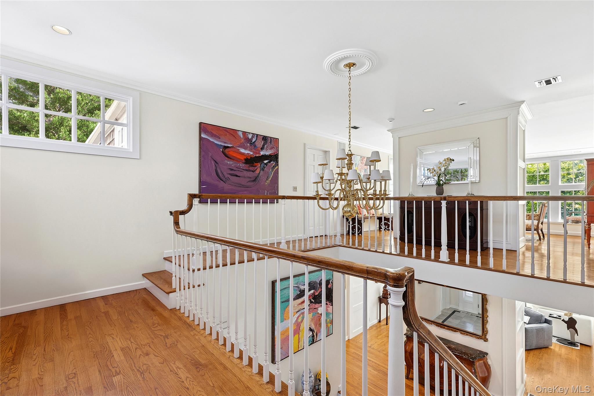33 Bridgefield Road, Unit 2446 MAIN STREET Bridgehampton, NY 11932 - Photo 22 of 28 a view of entryway and hall with wooden floor