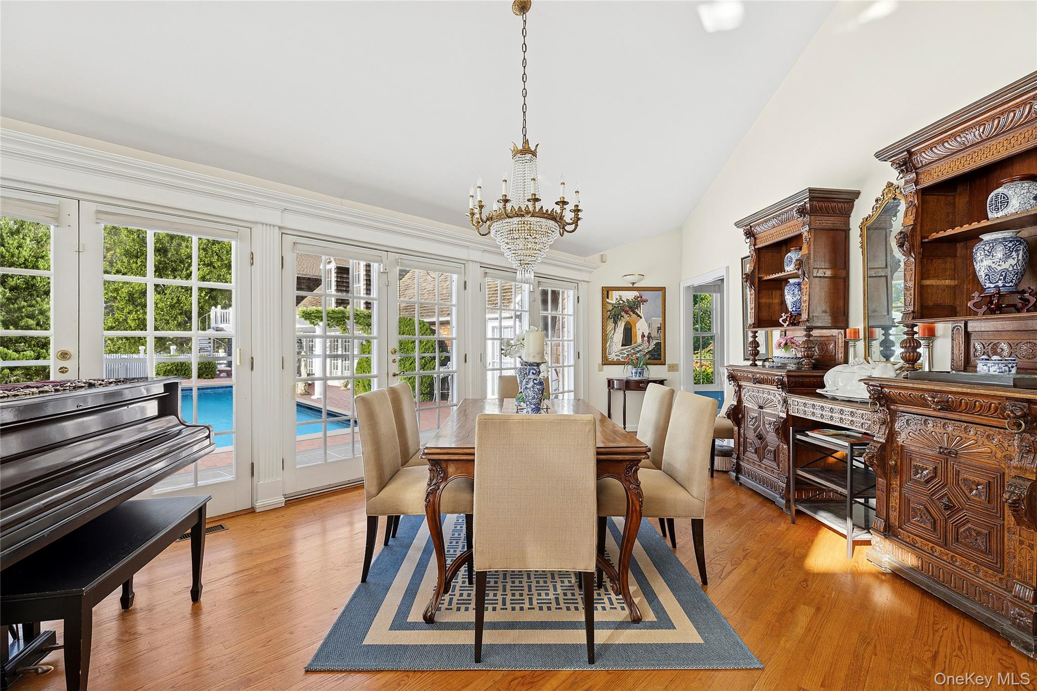 33 Bridgefield Road, Unit 2446 MAIN STREET Bridgehampton, NY 11932 - Photo 7 of 28 a view of a dining room with furniture window and wooden floor