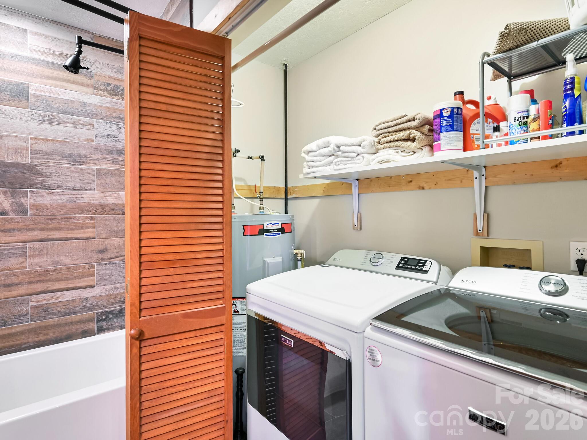 1954 Utah Mountain Road Waynesville, NC 28785 - Photo 24 of 36 a utility room with dryer and washer