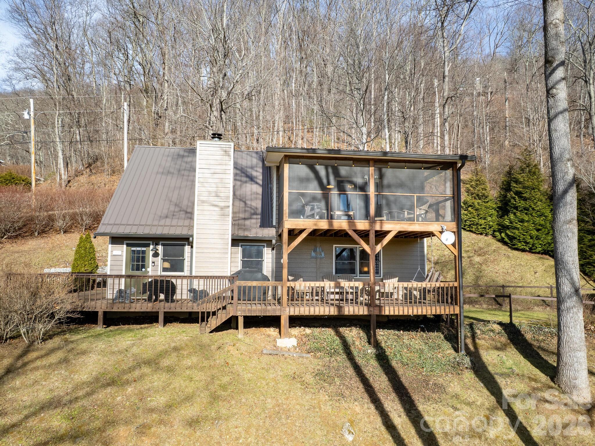 1954 Utah Mountain Road Waynesville, NC 28785 - Photo 5 of 36 a view of a roof deck
