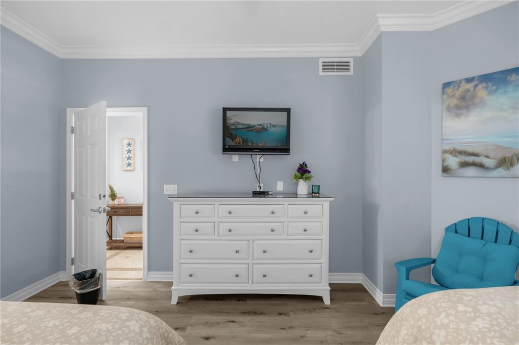 7618 Sandy Ridge Drive, Unit 103 Reunion, FL 34747 - Photo 15 of 37 a living room with furniture and a flat screen tv