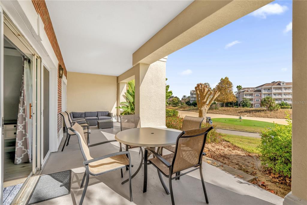 7618 Sandy Ridge Drive, Unit 103 Reunion, FL 34747 - Photo 21 of 37 a view of an outdoor seating area