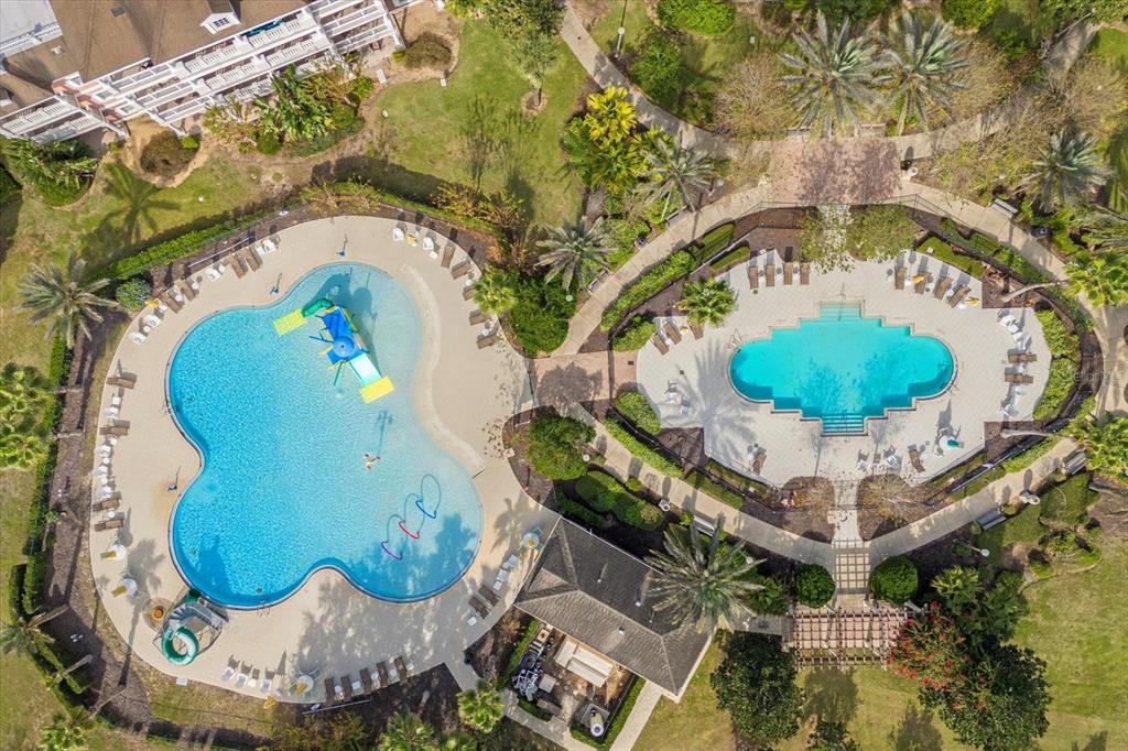 7618 Sandy Ridge Drive, Unit 103 Reunion, FL 34747 - Photo 28 of 37 a picture of a table and a vase sitting on a floor