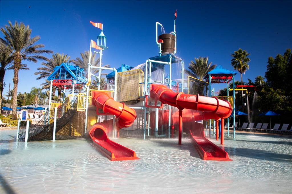 7618 Sandy Ridge Drive, Unit 103 Reunion, FL 34747 - Photo 34 of 37 an outdoor space with lots of furniture