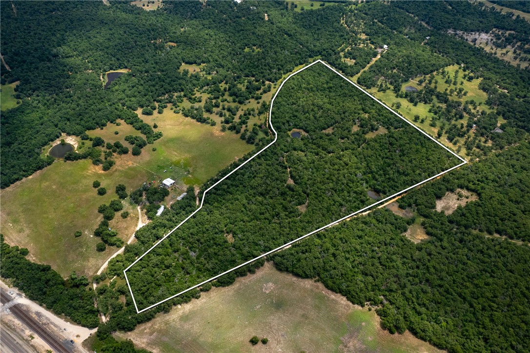 145 Private Road 6070 Cameron, TX 76520 - Photo 15 of 24 an aerial view of a pool