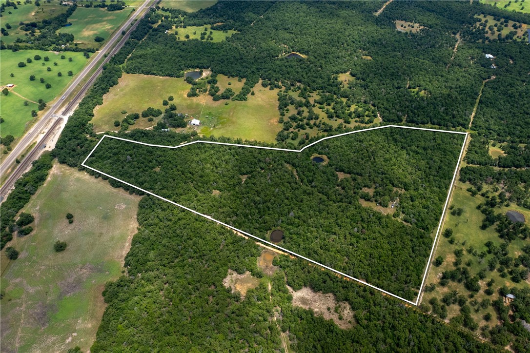145 Private Road 6070 Cameron, TX 76520 - Photo 16 of 24 an aerial view of a house
