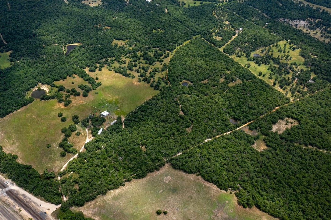 145 Private Road 6070 Cameron, TX 76520 - Photo 6 of 24 an aerial view of a house with a yard