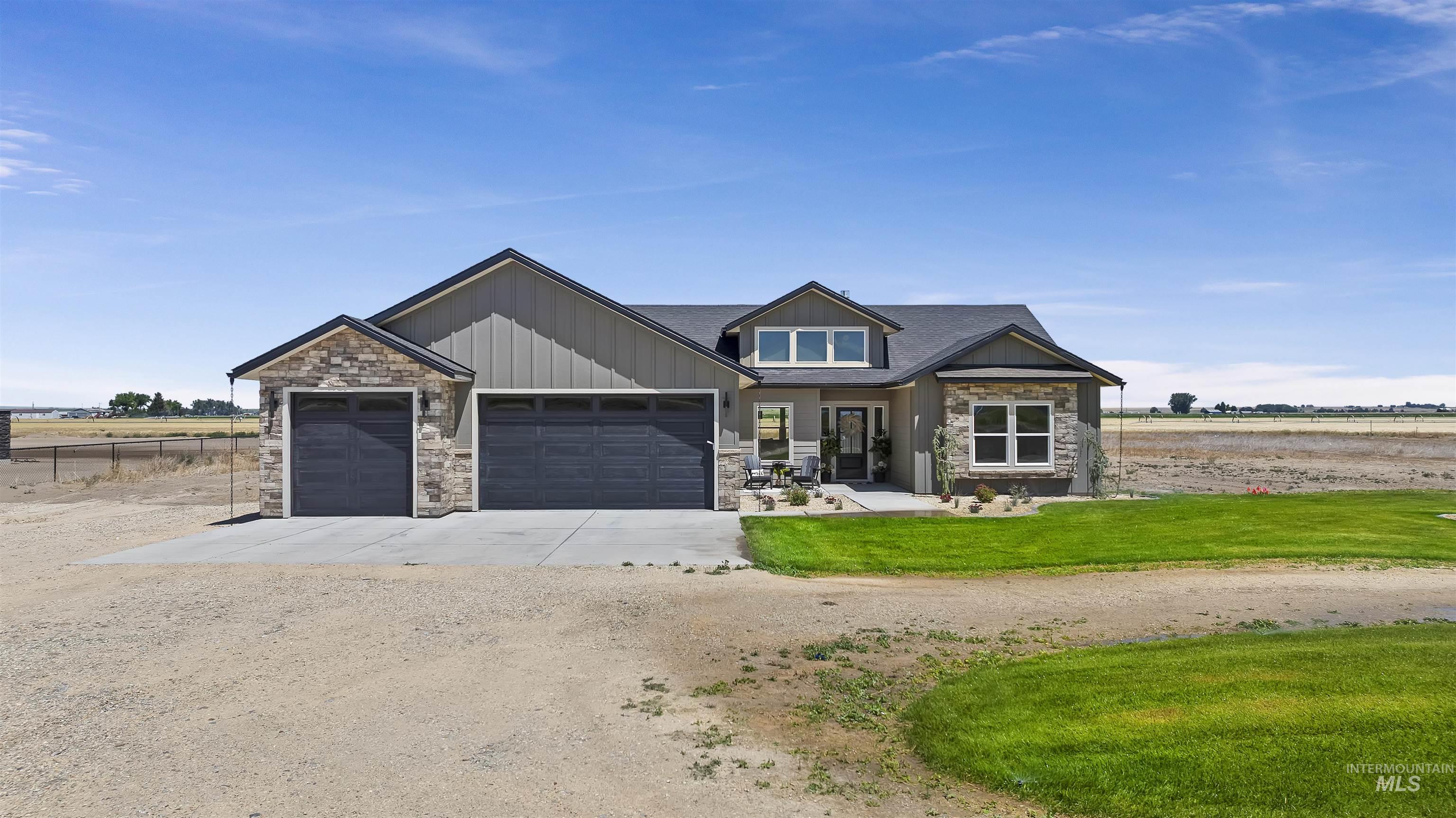 378 West 100 South Rupert, ID 83350 - Photo 2 of 50 Contemporary exterior with stone accents and board and batten siding